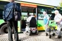 Image of bus and passengers
