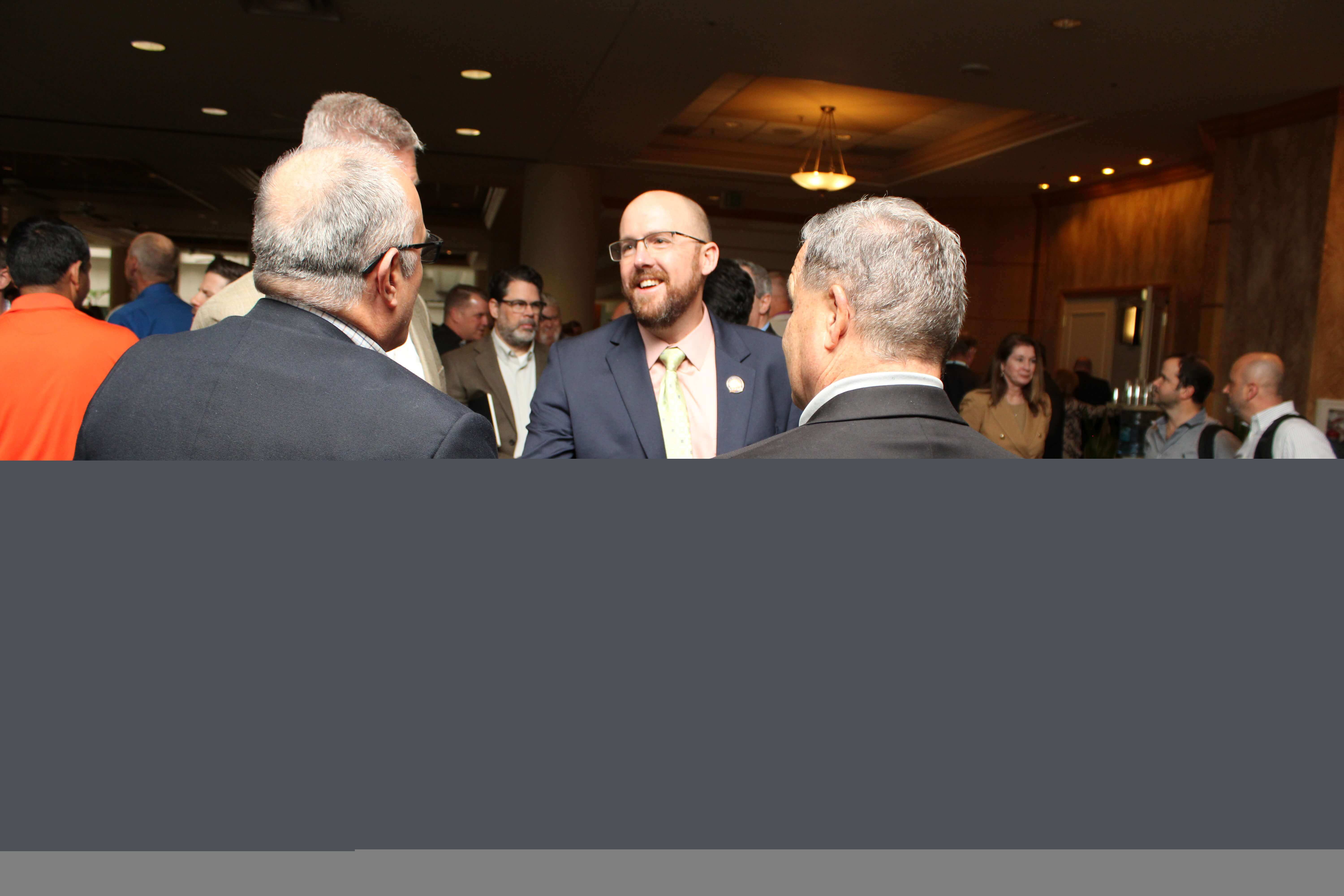 Secretary Jared Perdue meets with attendees at the 2024 FDOT Industry Forum.