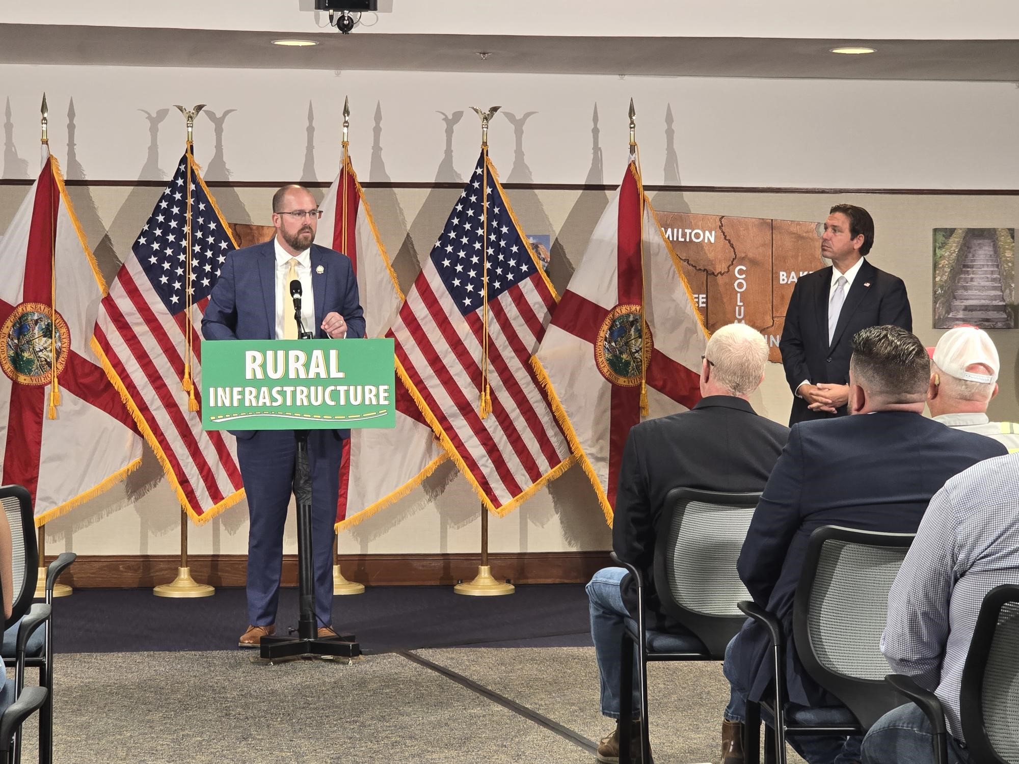 Secretary Jared W. Perdue, P.E., and Governor Ron DeSantis.