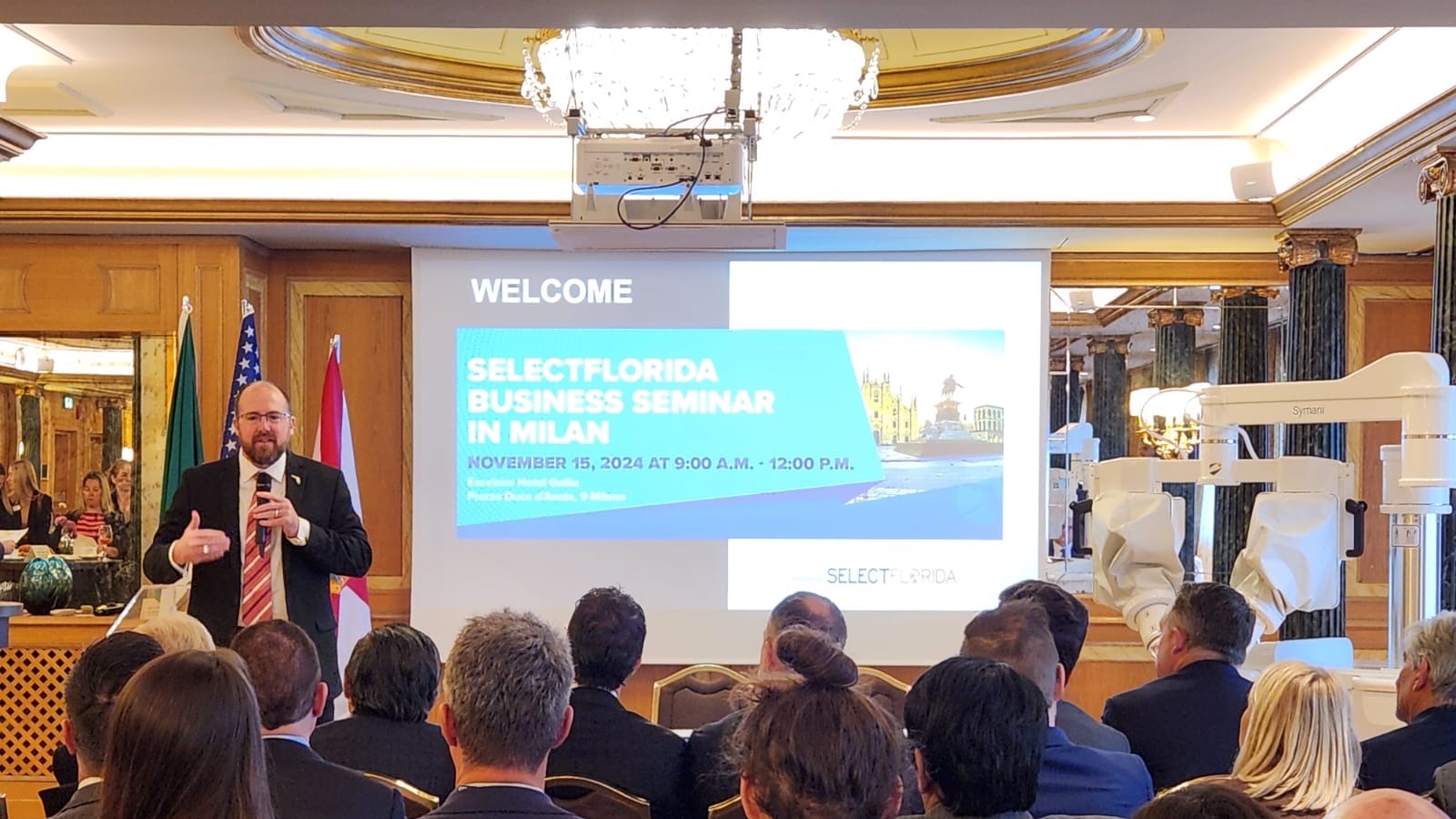 Secretary Jared W. Perdue, P.E. gives a presentation in Milan, Italy.