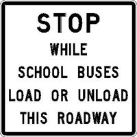 Stop while school buses load