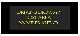 driving drowsy rest area xx miles ahead.